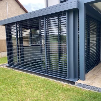 Véranda et brise soleil  en extension de maison