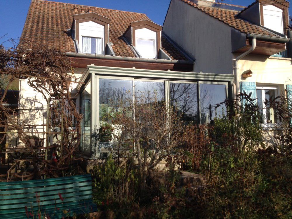 Véranda installée sur terrasse en Meurthe