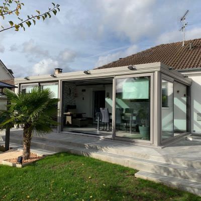 Véranda avec stores et volets Véranda avec stores et volets