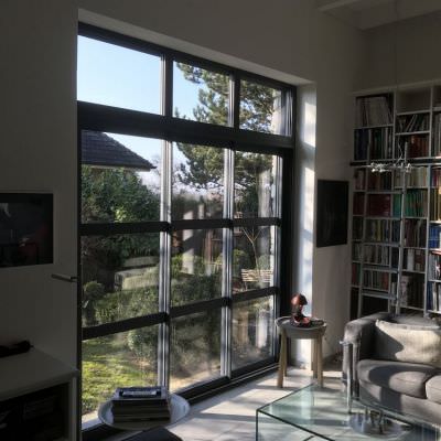 Grande baie coulissante style verrière 