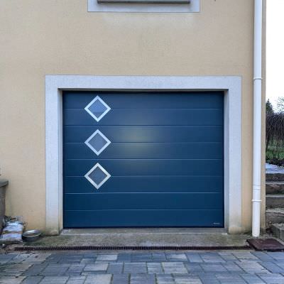 Porte de garage alu avec décor Limey-Remenauville (54)